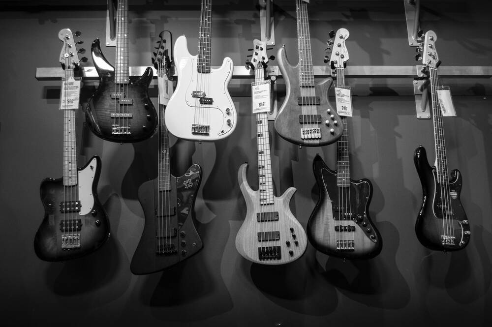 Various electric guitars handing on a wall