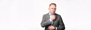 Jake Smolarek, an executive coach, demonstrating the intense analytical focus required to deconstruct the patterns of imposter syndrome in leaders.