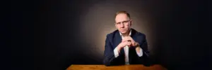 Jake Smolarek's portrait for an article on negotiation psychology, pressure, and deal regret